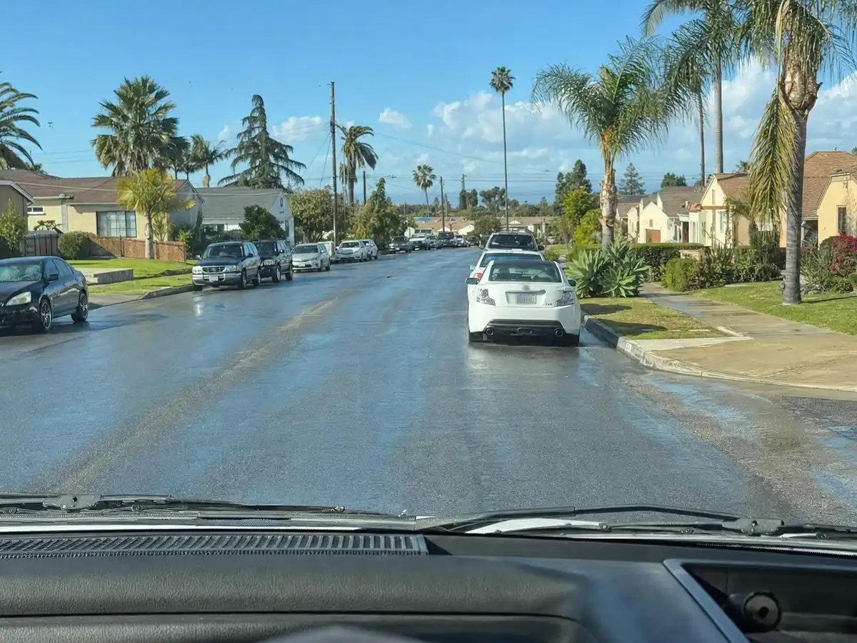 Service van arriving on a Burbank, CA street — local same-day coverage